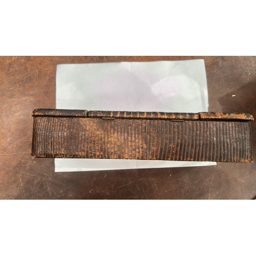 179 - Rectangular wooden trinket box clad in lizard-pattern leather, three hinged lids opening to a partit... 