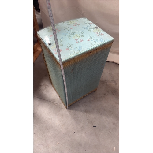 181 - Light blue painted wood and woven wicker bedside cabinet, floral fabric top beneath glass, rope edgi... 