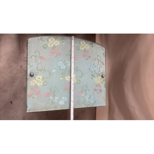 181 - Light blue painted wood and woven wicker bedside cabinet, floral fabric top beneath glass, rope edgi... 