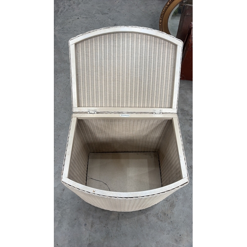 182 - Semi-circular light taupe synthetic wicker hamper with hinged lid and interior plaque reading “Brown... 