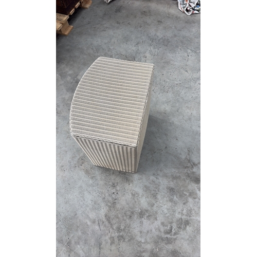 182 - Semi-circular light taupe synthetic wicker hamper with hinged lid and interior plaque reading “Brown... 