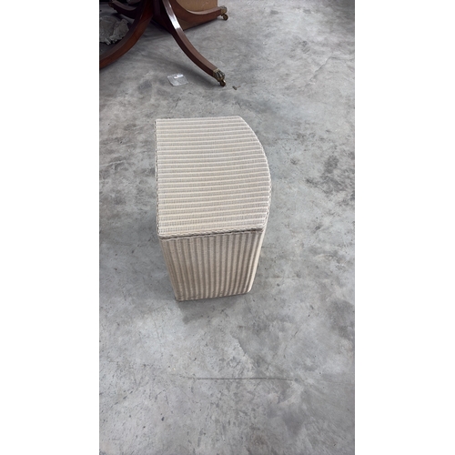 182 - Semi-circular light taupe synthetic wicker hamper with hinged lid and interior plaque reading “Brown... 