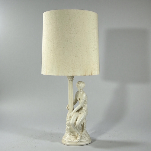 186 - A vintage painted plaster figural table lamp.