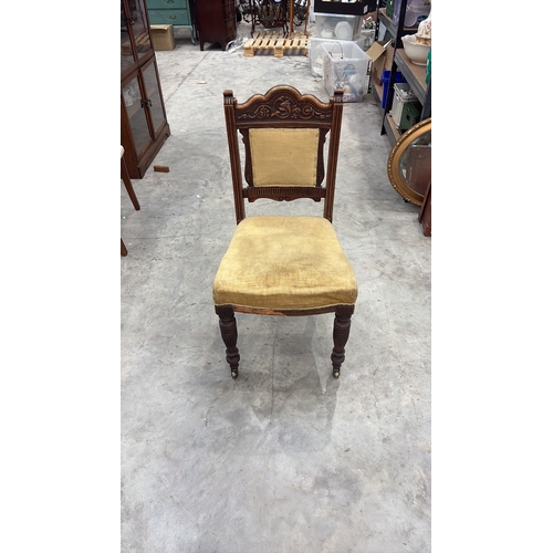 203 - Carved walnut side chair, late Victorian, serpentine crest with foliate and griffin relief, padded b... 