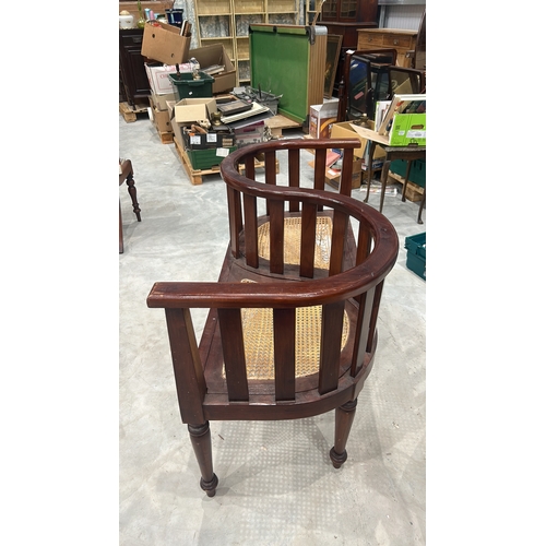 209 - Colonial-style mahogany tête-à-tête conversation bench with serpentine spindle backrest and twin wov... 