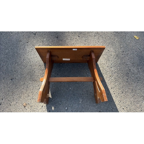 212 - Small rectangular wooden footstool or low side table, trestle-style legs with cut-out detail and cen... 