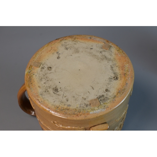 228 - A large 19th century Doulton Lambeth stoneware three handled Tyg, together with a similar Jug.