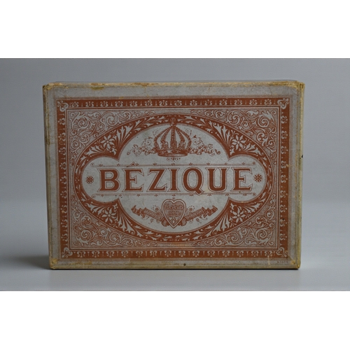 232 - A vintage boxed Bezique card game.