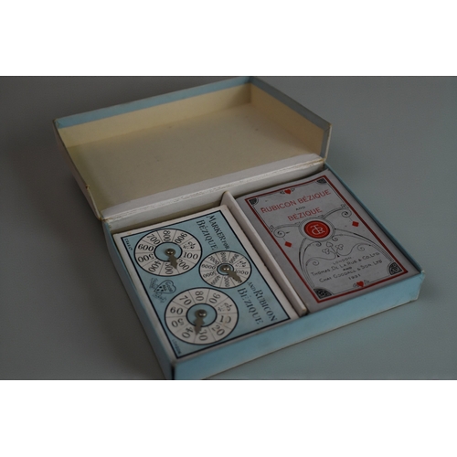 232 - A vintage boxed Bezique card game.