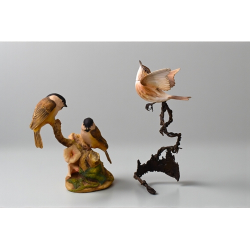 251 - A Royal Worcester porcelain bird, together with an Anne Wall for Border Fine Arts figure group.