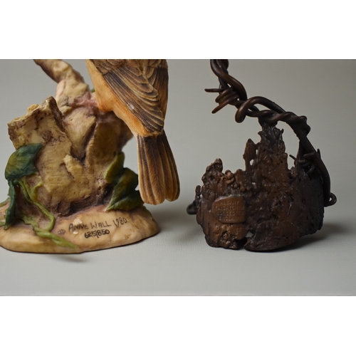 251 - A Royal Worcester porcelain bird, together with an Anne Wall for Border Fine Arts figure group.