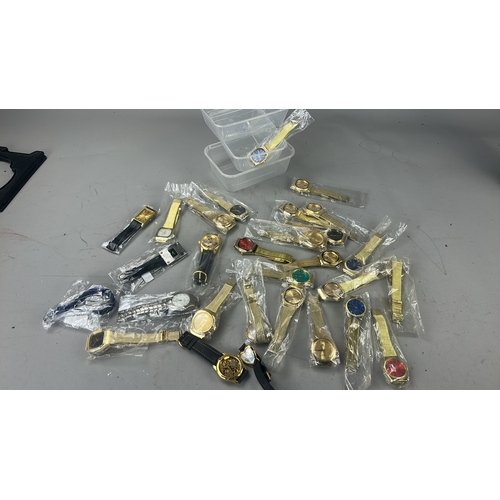 81 - Collection of assorted gold-tone and mixed metal quartz wristwatches with varied dial colours and st... 