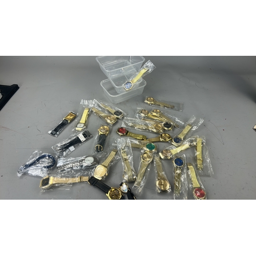 81 - Collection of assorted gold-tone and mixed metal quartz wristwatches with varied dial colours and st... 