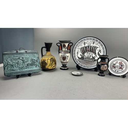 102 - Collection of seven modern Greek souvenir pieces comprising three painted amphora-form vases, two ci... 