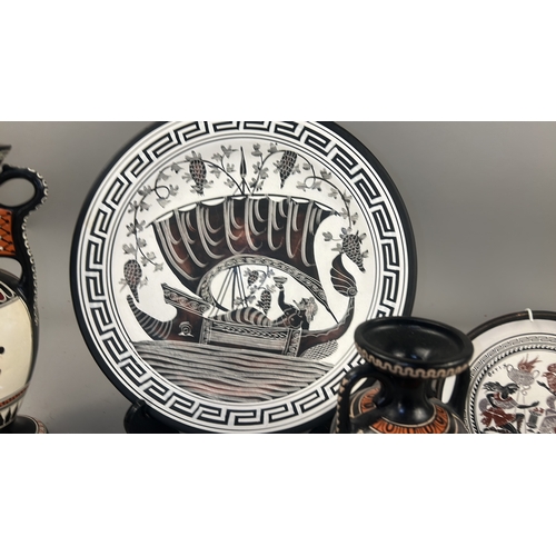 102 - Collection of seven modern Greek souvenir pieces comprising three painted amphora-form vases, two ci... 