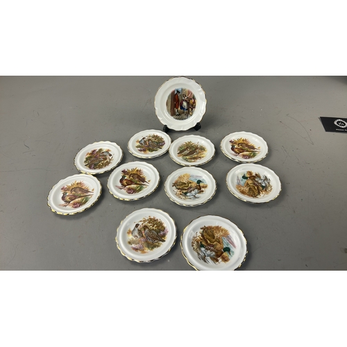 105 - Set of eleven English bone china side plates by Royal Stafford, each scallop-rimmed with gilded edge... 