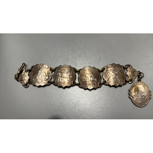 131 - Group of three Chinese export-style gilt metal bracelets: braided rope filigree example with green c... 