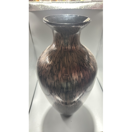132 - Black and copper-toned blown art glass vase with flared rim, slender neck and ovoid body, decorated ... 