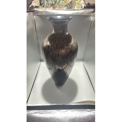 132 - Black and copper-toned blown art glass vase with flared rim, slender neck and ovoid body, decorated ... 