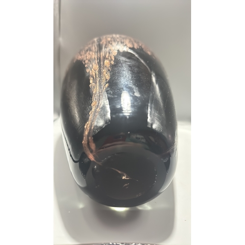 132 - Black and copper-toned blown art glass vase with flared rim, slender neck and ovoid body, decorated ... 