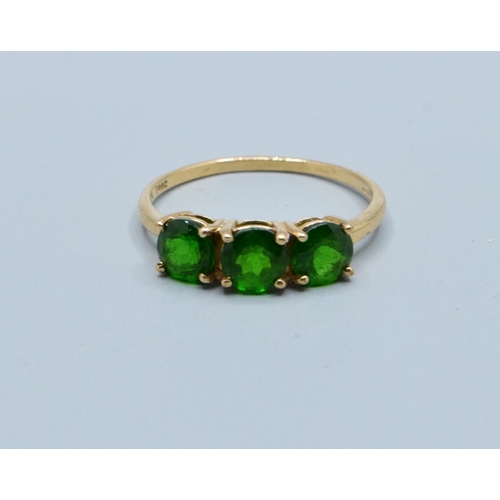 18 - 9ct gold ladies 3 stone Diopside dress ring held in a claw design size S,