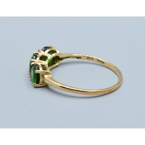 18 - 9ct gold ladies 3 stone Diopside dress ring held in a claw design size S,