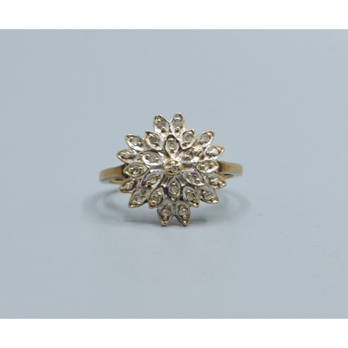 33 - 9ct gold ladies Diamond star burst cluster ring hallmarked as Diamond in the ring size L