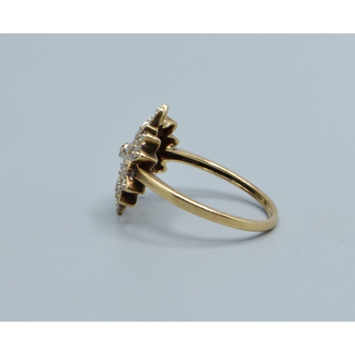 33 - 9ct gold ladies Diamond star burst cluster ring hallmarked as Diamond in the ring size L