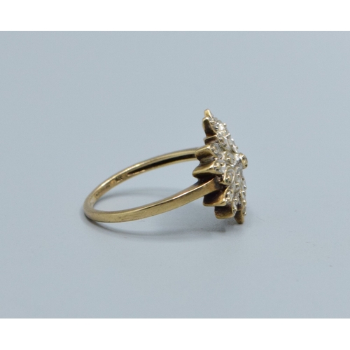 33 - 9ct gold ladies Diamond star burst cluster ring hallmarked as Diamond in the ring size L