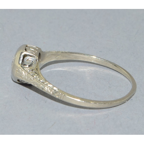 35 - 18ct white gold vintage Diamond solitaire dress ring held in an enclosed design estimated as 20 poin... 