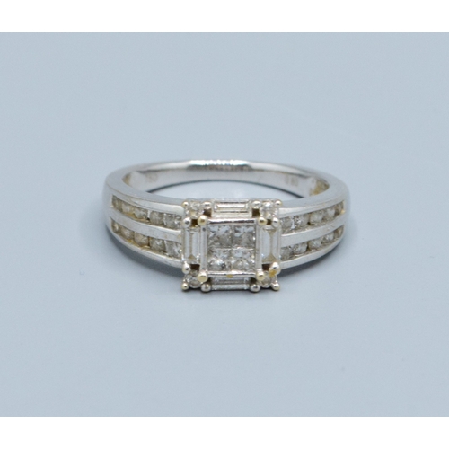 63 - 18ct white gold ladies Diamond fancy statement ring showing both baguette and round cut diamonds wit... 
