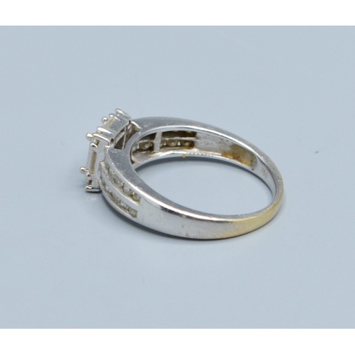 63 - 18ct white gold ladies Diamond fancy statement ring showing both baguette and round cut diamonds wit... 