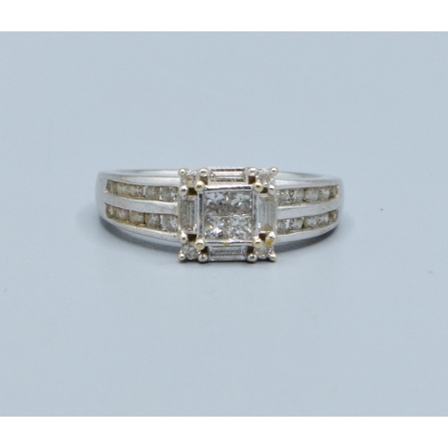 63 - 18ct white gold ladies Diamond fancy statement ring showing both baguette and round cut diamonds wit... 
