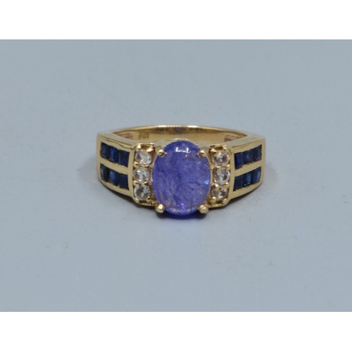 78 - 9ct gold ladies cabochon unpolished Amethyst ring with Amethyst and clear gem set decoration to the ... 