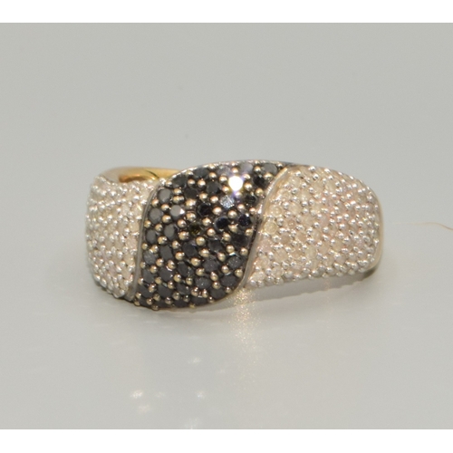 110 - 9ct gold ladies Twin colour Diamond statement ring in a wave pattern hall marked as Diamond  size P,... 