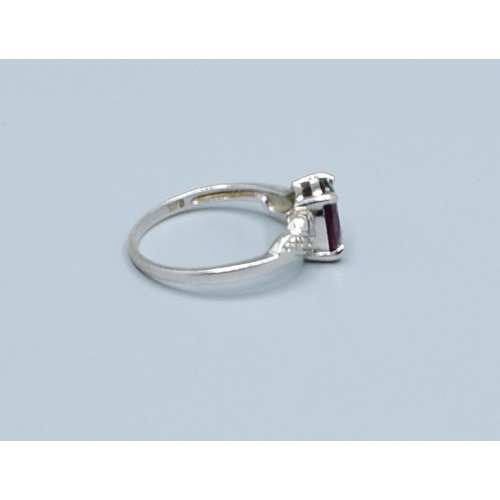 125 - 9ct white gold TGGC oval Garnet and Diamond shoulder ring size O, 2.5grams