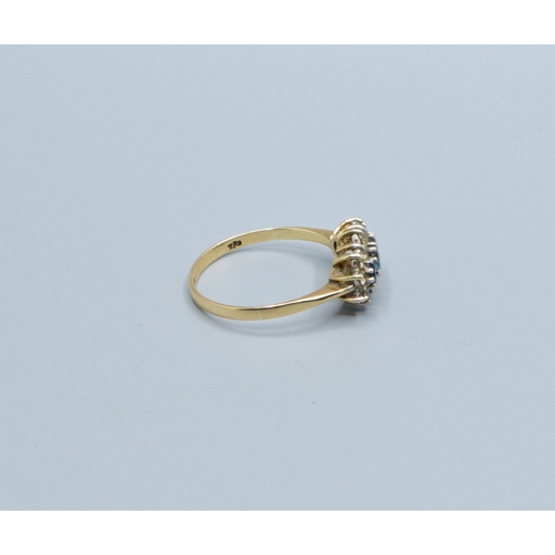 153 - 9ct gold ladies triple halo Aquamarine and gem stone halo ring held in a cage design size Q