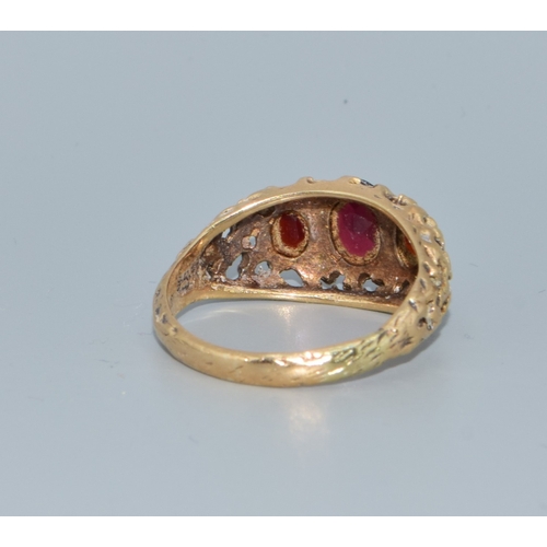 200 - 9ct gold Antique 3 stone Garnet ring in an open work setting size N, 4.0grams