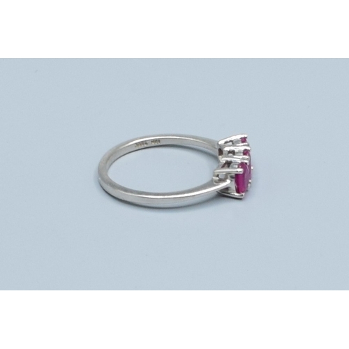 241 - 9ct white gold ladies 3 stone Ruby ring size N