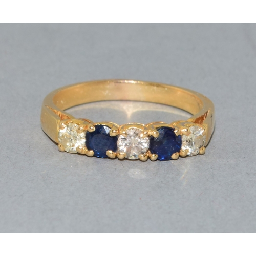 275 - 18ct gold ladies vintage Diamond and Sapphire ring held in an enclosed claw setting with approx 45 p... 