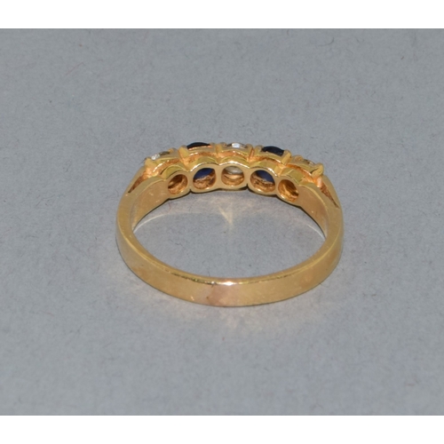 275 - 18ct gold ladies vintage Diamond and Sapphire ring held in an enclosed claw setting with approx 45 p... 