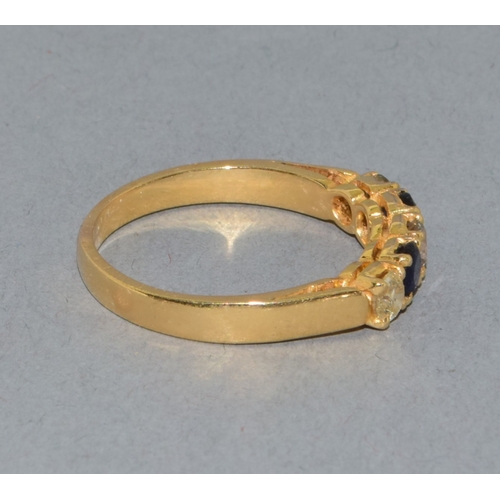275 - 18ct gold ladies vintage Diamond and Sapphire ring held in an enclosed claw setting with approx 45 p... 