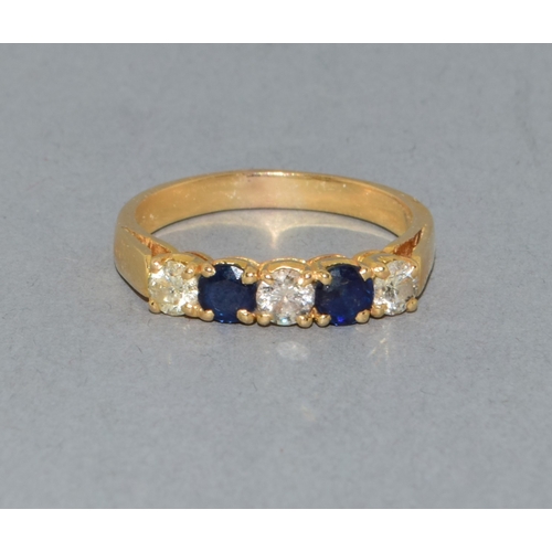 275 - 18ct gold ladies vintage Diamond and Sapphire ring held in an enclosed claw setting with approx 45 p... 