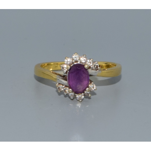 290 - 18ct gold ladies Amethyst and Diamond halo dress ring 3.6grams size P