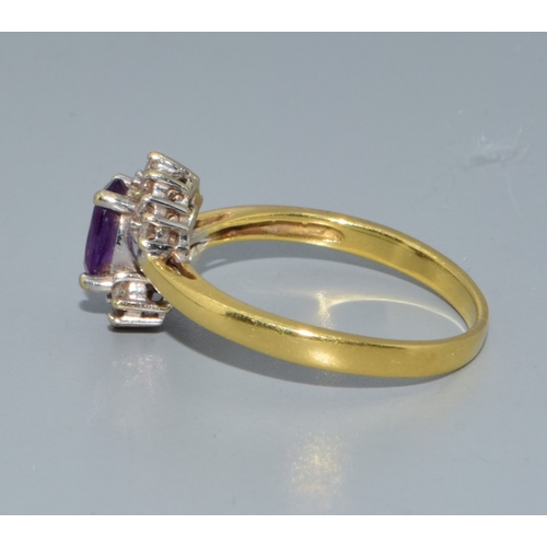 290 - 18ct gold ladies Amethyst and Diamond halo dress ring 3.6grams size P