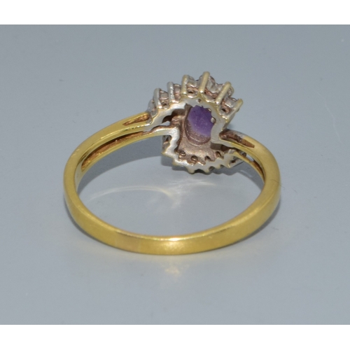 290 - 18ct gold ladies Amethyst and Diamond halo dress ring 3.6grams size P