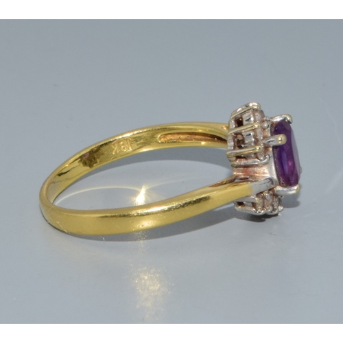 290 - 18ct gold ladies Amethyst and Diamond halo dress ring 3.6grams size P