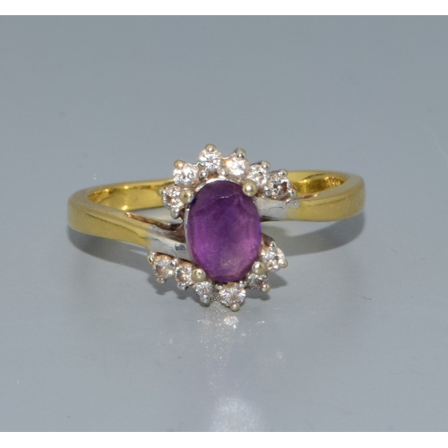 290 - 18ct gold ladies Amethyst and Diamond halo dress ring 3.6grams size P