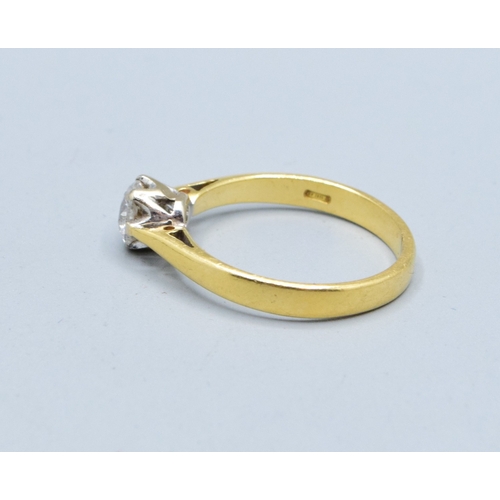 304 - 18ct gold ladies Diamond solitaire ring in a classic design the stone measures 5.5mm across the face... 