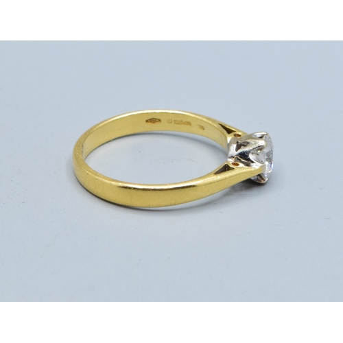 304 - 18ct gold ladies Diamond solitaire ring in a classic design the stone measures 5.5mm across the face... 